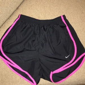 Black nike shorts with pink trim